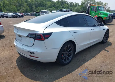 2022 Tesla Model 3 Rear-Wheel Drive from USA, damaged, VIN 5YJ3E1EA9NF122211